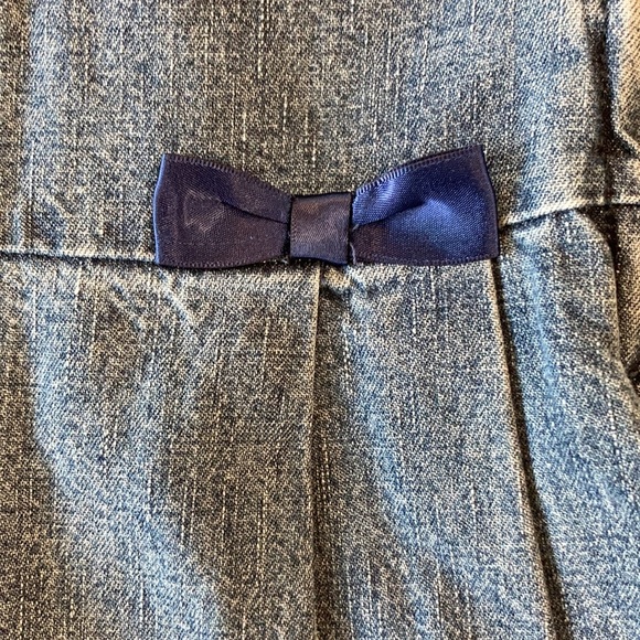Pleated denim toddler skort with bows - Picture 3 of 4